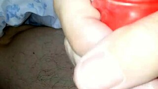 Wearing latex suit with sheath, husband and amateurs in costumes.