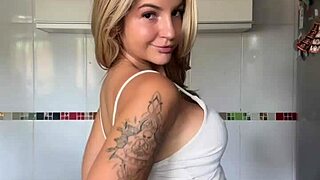 Young Blonde Shakes Her Big Ass, Showing Pierced Nipples in Solo Display
