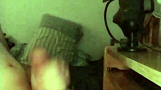 On a rainy day, this skinny young solo amateur jerks off his big monster cock in a sexy session.