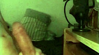 On a rainy day, this skinny young solo amateur jerks off his big monster cock in a sexy session.