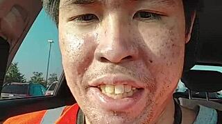 Asian mature woman walking about during work in public.