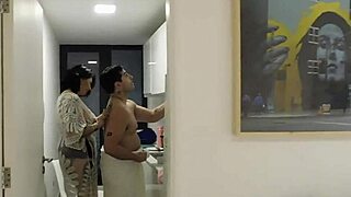 tattooed woman trades oil for intimate encounter, leading to passionate session.