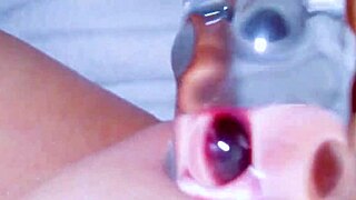 Curious coed squirts on glass toy 😮💦