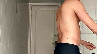 Sexy Guy In Black Beach Shorts Shaving