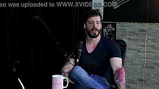 Arthur Aily in sheer red lingerie, exploring pain and inversion during group play