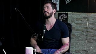 Arthur Aily in sheer red lingerie, exploring pain and inversion during group play