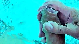 i jerk off naked in the pool, feeling the water around me