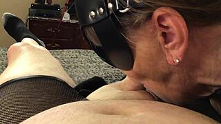 Granny in catwoman costume sucks cock deeply in pov