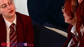 Two redhead uniformed students eat pussy and 69