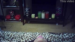 Behind the scenes camera footage of glasses-wearing model in first time shoot