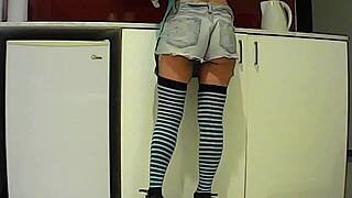 Latina brunette eats banana in kitchen then sucks big cock