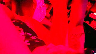 Red light special wife relaxes with legs up during intimate moment.