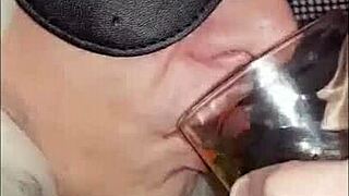 Blindfolded bisexual crossdresser fed own pee by girlfriend, humiliating!