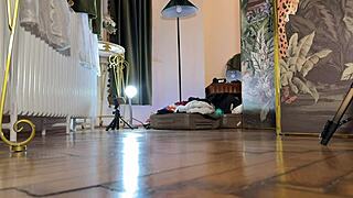 Beautiful brunette babe tries on lingerie and mini skirts backstage for a haul day