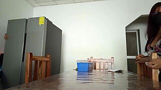 The maintenance man checks the refrigerator while the housewife behaves STRANGELY by SHOWING her VAGINA on the TABLE!