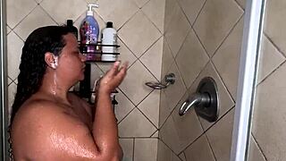 Bbw flaunts huge tits and ass in soapy shower