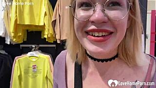 gf gives a blowjob in the changing booth