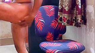 Feminized bodybuilder in jeans before work shift