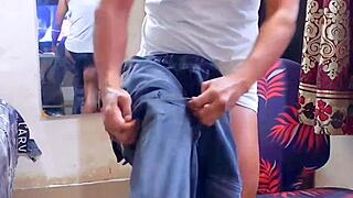 Feminized bodybuilder in jeans before work shift