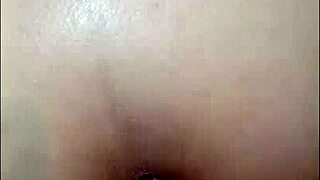 Brunette moans during anal with crossdresser