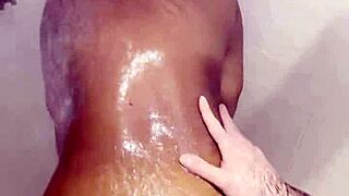 Thick ebony babe deepthroats monster cock then fucked rough in shower cumshot facial
