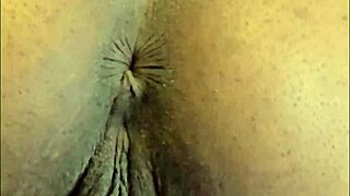 damn this ebony slut spreads shaved pussy fingers clit til she moans orgasming