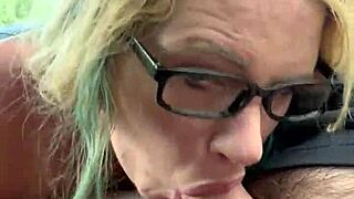 Pretty glasses hooker sucks cum deep in public car blowjob