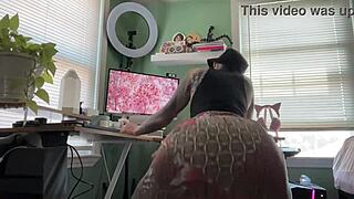 Kodak Black's Elle twerks in the office and shows off her tattooed ass