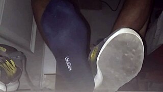 Blue sweaty socks and bare feet get cumshot